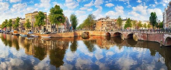 Amsterdam Canal houses  vibrant reflections, Netherlands, panorama - obrazy, fototapety, plakaty