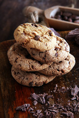 Chocolate cookies on wooden table. Chocolate chip cookies shot