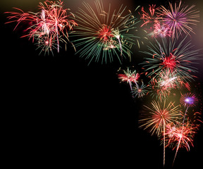 Fireworks on dark black sky background for new year celebration, party, festival or special occasions with copy space for text insertion or decoration
