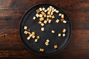 croutons in a frying pan