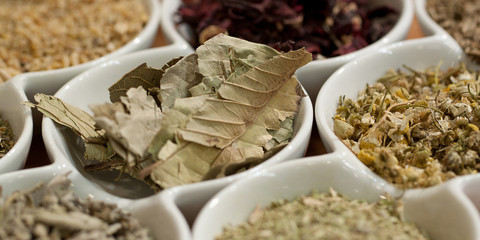 different fragrant dry spices in the shop window