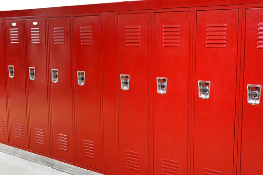  close up on red lockers in gym