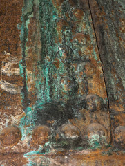 Verdigrised copper plate and bolts