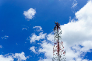 telecommunication tower for radio wave or mobile cellular with beautiful clear blue sky and little...