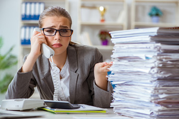 Young businesswoman accountant working in the office
