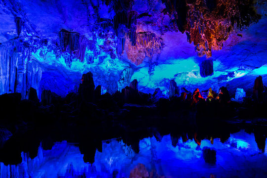 Illuminated lake in Reed flute cave in Guilin, China. © Anette Andersen