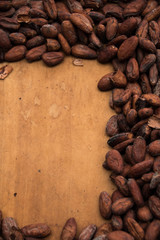 Roasted Cocoa Beans on a Wooden Table 
