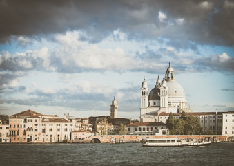 Symbol Venice vintage, Venetian bridge with Punta della Dogana and Basilica di Santa Maria della Salute, background Venice in Italy with church Salute, Venetian panorama with Santa Maria della Salute
