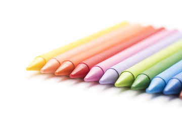 Group of colored crayons on white background