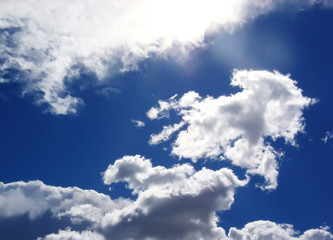 Fototapeta premium Blue sky with fluffy white clouds in day light
