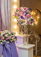 wedding arrangement of fresh flowers in a vase
