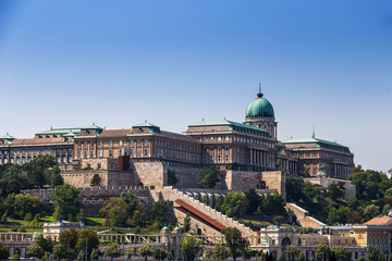 Fototapeta na wymiar Budapest, Hungary - The beautiful Buda Castle Royal Palace and Varkert bazar on a bright summer day with clear blue sky