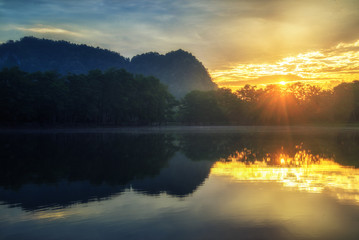 reflection of sunlight and lake in Thailand