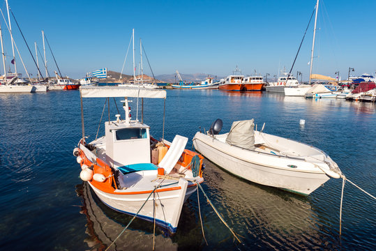  Fishing boats docked in the port of Naxos town (Chora). Cyclades Islands, Greece.