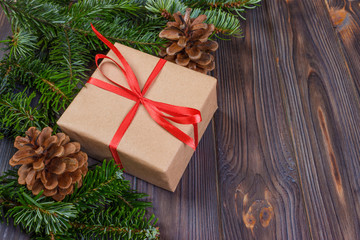 Fototapeta na wymiar Christmas presents in decorative boxes, white wood background