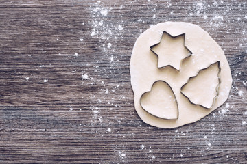 Forms for the test . Cookie cutters in the form of a tree of hearts and stars. The view from the top.