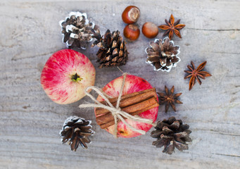 dessert, apple with cinnamon and nuts, Christmas decor and food on a wooden table