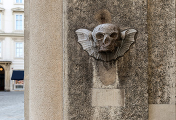 Skull bas relief as element of gothic architecture. Vienna, the church of St. Stephen, Austria