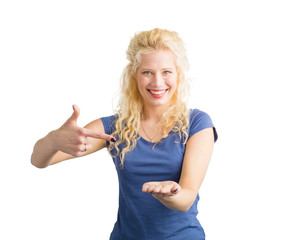 Woman pointing at invisible objet that she is holding