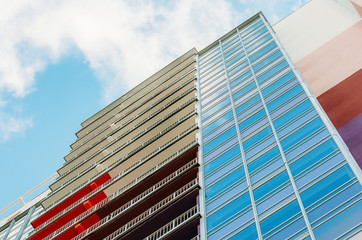 Building of glass and concrete view to the top of the sky