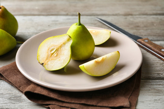 Ripe pears on plate