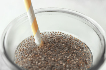 Chia seeds in glass of water, closeup