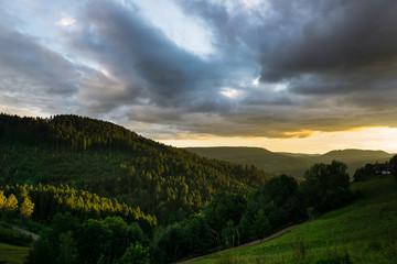 Black Forest Germany with spectacular sunset and dramatic sky in autumn season