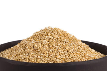 Pile of grain quinoa seeds in bowl