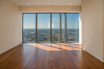 Empty  interior apartment with panoramic city view.