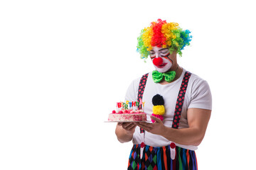 Funny clown with a birthday cake isolated on white background