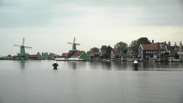 Afternoon view of the Typical Dutch windmills, Zaanse Schans, Netherlands