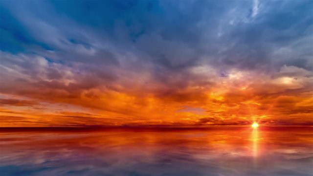 Beautiful cloudscape and sunset breaking through cloud over lake reflection. god rays, also called crepuscular rays, streaming through gaps in clouds. Time lapse 4K