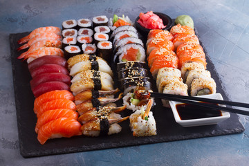 Japanese sushi big set with pair of black chopsticks