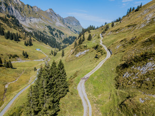 Fototapeta na wymiar Aerial view of valley in Swiss mountains along Pragel Pass