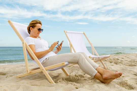Woman relaxing on beach 