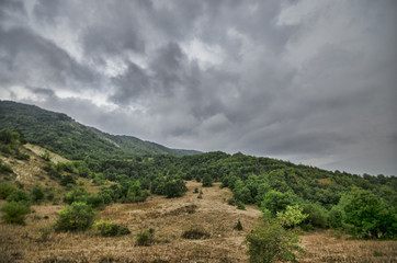 Cycling mountain road. Misty mountain road in high mountains. Cloudy sky with mountain road of Azerbaijan