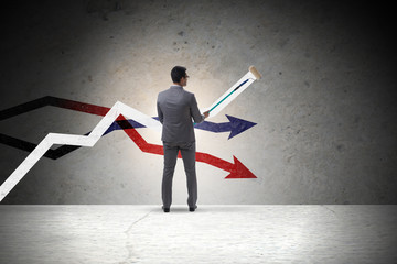 Businessman drawing charts in forecasting concept