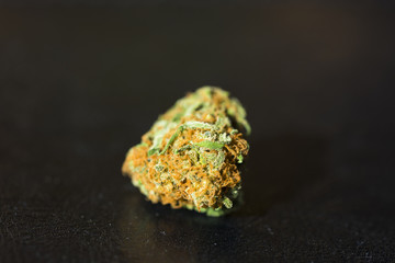 Marijuana bud isolated on black background