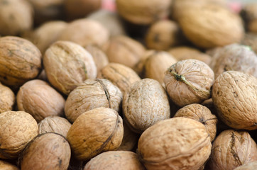 Walnuts background. Group walnuts. Healthy organic food concept.