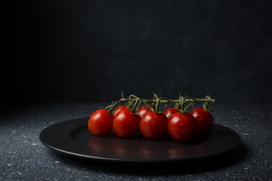 Cluster Of Fresh Ripe Tomatoes