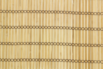 Mat for sushi in the background