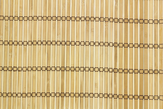 Mat for sushi in the background