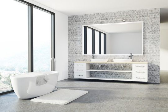 Concrete bathroom, white tub, sink, loft