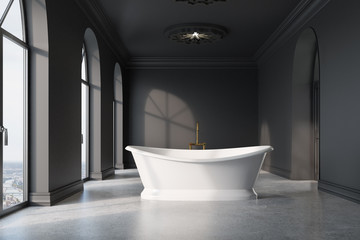 Fototapeta na wymiar Dark gray bathroom, original white tub