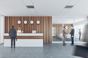 White wooden reception, meeting room, front people