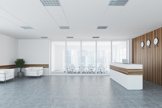 White and wooden reception, meeting room side