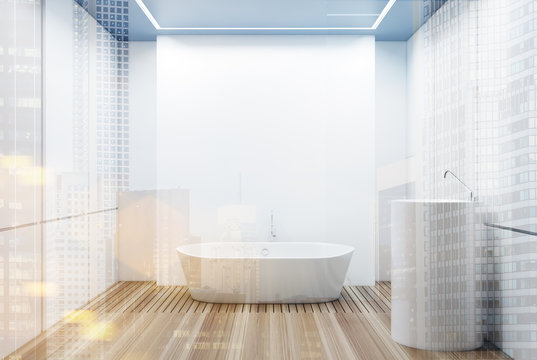 White tiled bathroom, white tub double