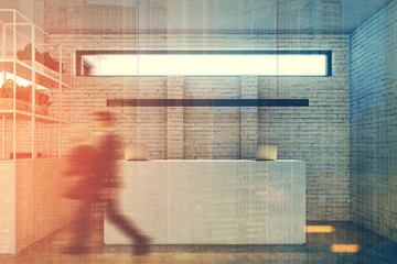 White brick office, white reception desk people