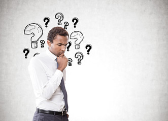 Pensive African American man, many questions
