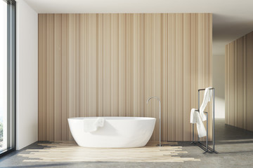 Fototapeta na wymiar Wooden bathroom, white tub